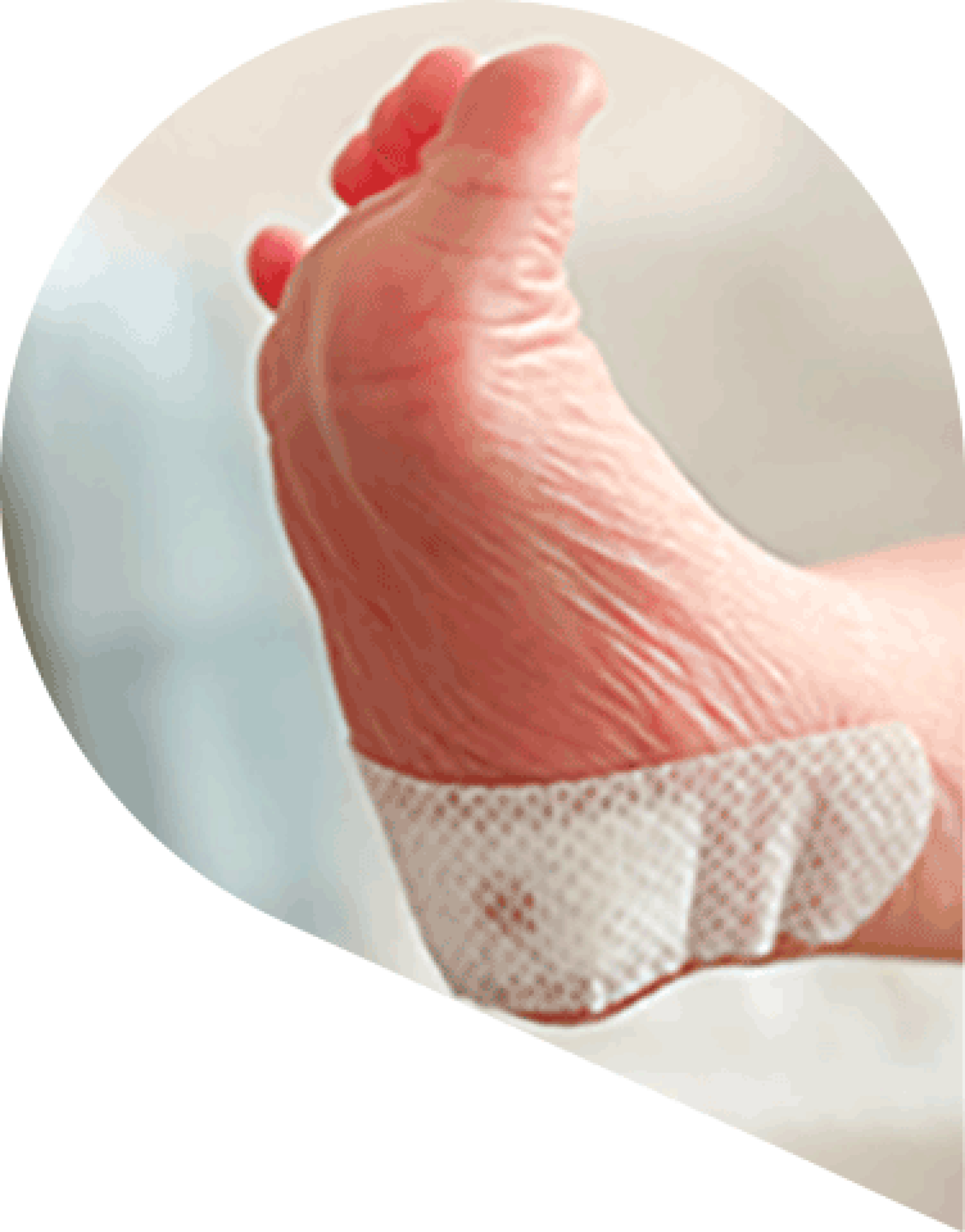 Infant foot with a spot of blood coming through a plaster on their heel