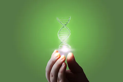 Phenylketonuria hand holding DNA helix 